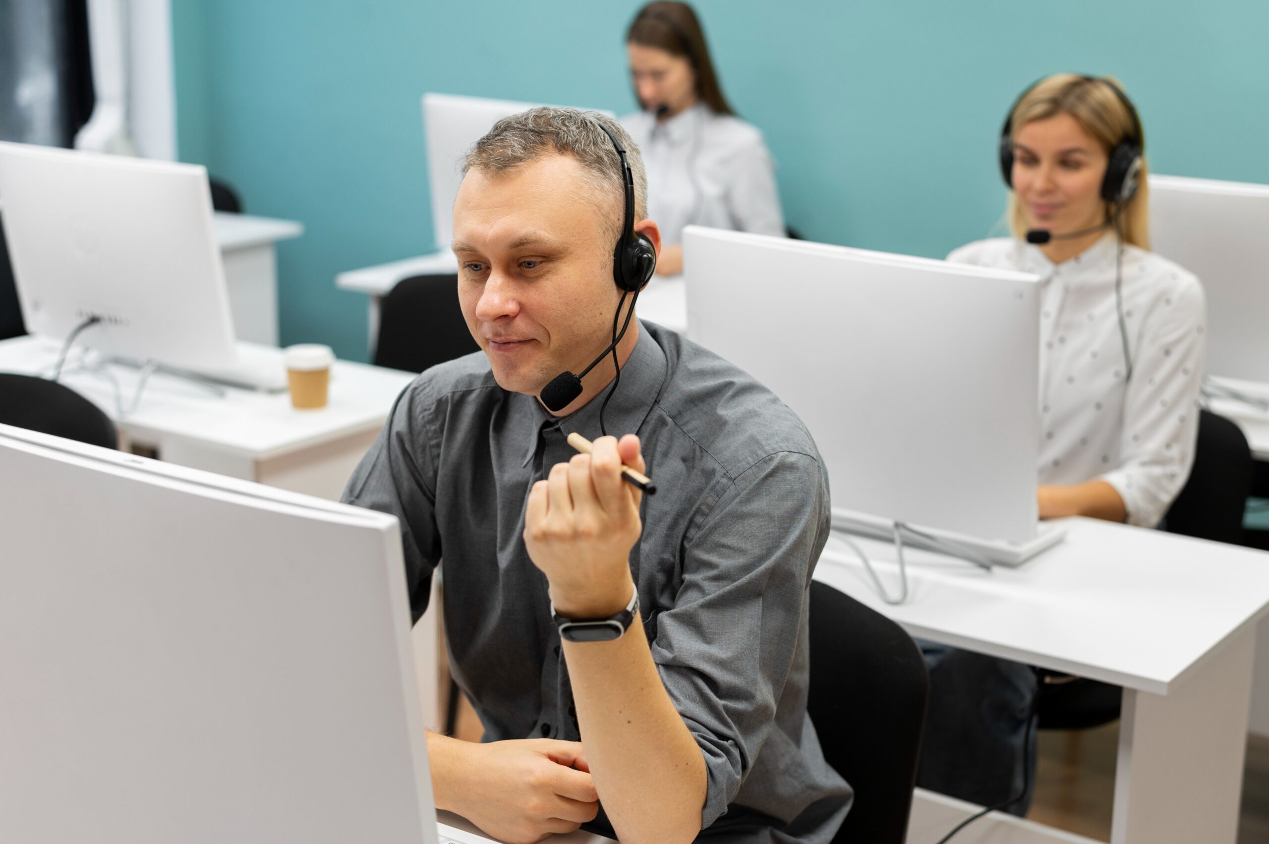 colleagues-working-together-call-center-office (1)